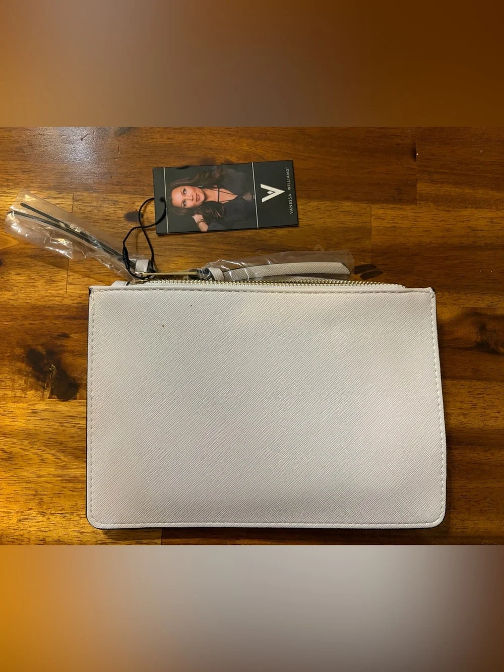 NWT Vanessa Williams Cream Wristlet Clutch with Gold V Accent
